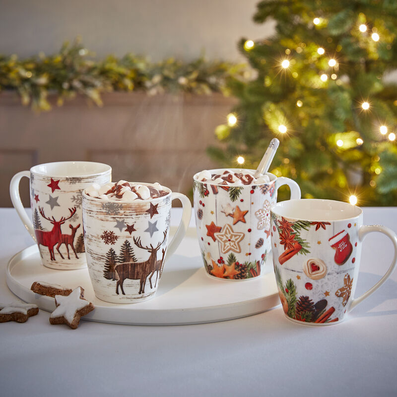 Jolies tasses de Noël aux motifs de rennes pour savourer chocolat chaud, thé, café ou vin chaud Photo 3