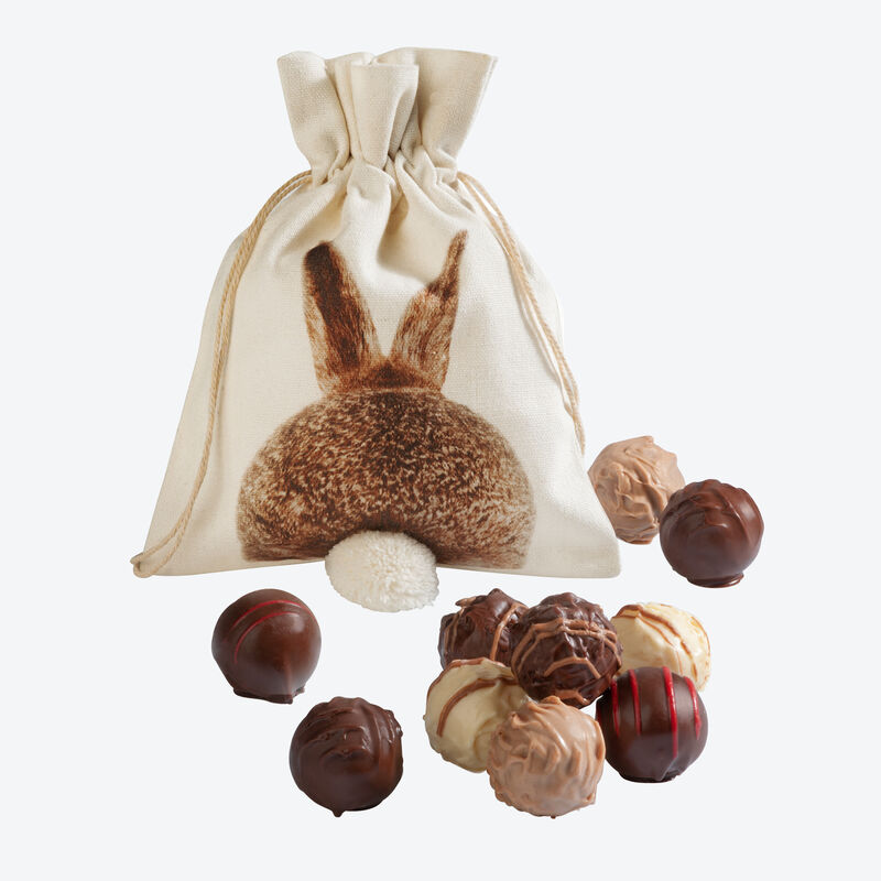 Le cadeau de Pâques parfait : sac à motif lapin aux délicieux chocolats