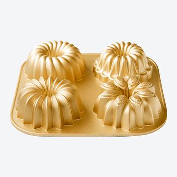 Image du produit pour ' Fins motifs, super conducteurs, antiadhsifs : moules de cuisson en fonte pour 4 jolis mini-gteaux'