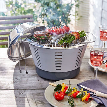 Image du produit pour 'Barbecue de table  charbon de bois : une chaleur de 250 C en 5 minutes grce au ventilateur turbo'