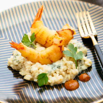 Image du produit pour 'Langoustines en crote de pommes de terre avec risotto au gorgonzola et pesto aux tomates cocktail'