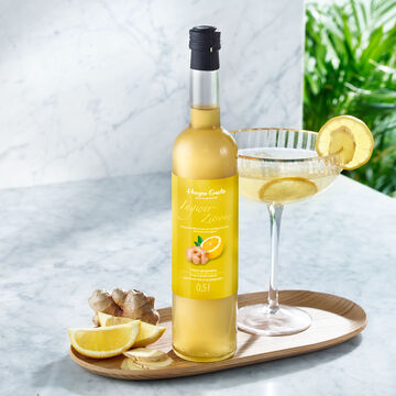 Image du produit pour 'Le sirop citron-gingembre rehausse les boissons, les glaces, les desserts, les salades, les sauces et les yaourts.'