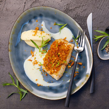 Image du produit pour 'Lotte sous crote de pignons de pin et sur pure de panais au beurre blanc'