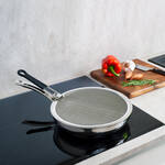 Image du produit pour 'Couvercle anti-projections pour po�le : la structure en acier inoxydable � mailles serr�es retient les particules de graisse les'