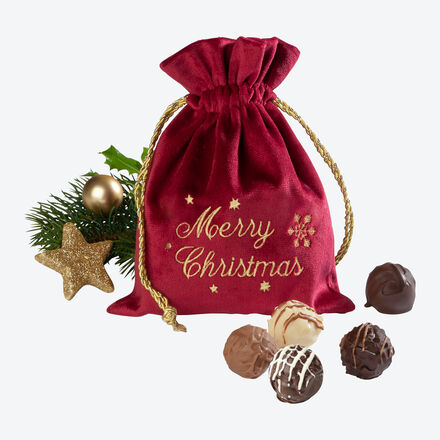 Image du produit pour 'lgant sachet cadeau de Nol garni de dlicieux chocolats'